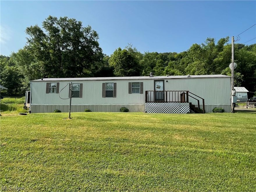Don't miss this opportunity to own a lovely mobile home with two bedrooms, one bath, a screened back porch, carport, and shed on a little over a half acre of land. Whether you have a daily commute or simply enjoy exploring the the surrounding areas, the proximity to the interstate makes it incredibly convenient. Schedule your showing today!