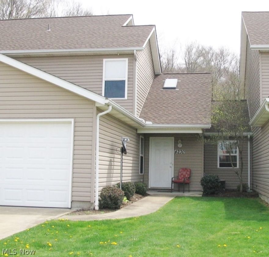 Welcome to 4230 Pine Drive in Rootstown, Ohio 44272!  Why rent when you can own? Two story 3 bedroom and 2 full bath condo located in the Marsh Creek subdivision. First floor features open floor plan with vaulted ceiling, living room/great room, dining area with patio doors to your private backyard. Numerous oak kitchen cabinets with snack bar and all appliances, first floor bedroom, full bath and laundry/utility room with washer & dryer. Second floor includes master bedroom adjoined with jack-n-jill full bath to another bedroom. Home has neutral palette and attached 2-car garage. HOA fee includes snow, trash & landscaping. Location is close to major highways, shopping, Northeaster College of Medicine &  Pharmacy and Kent State University. Nothing to do but move in!!
