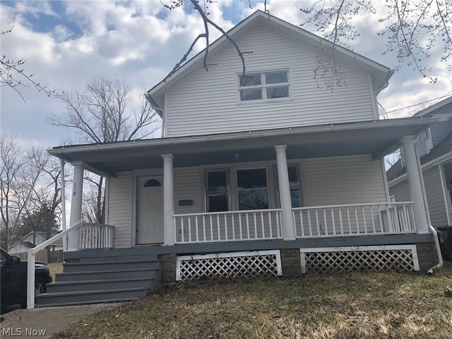 Elyria Colonial With Front Porch Offers 3 Bedrooms and 2 Full Baths! Needs Work, But Has Loads Of Potential! Living Room With Decorative Fireplace. Wood Floors In Most Rooms. Full Basement For Storage. Call Today! Great Value!!