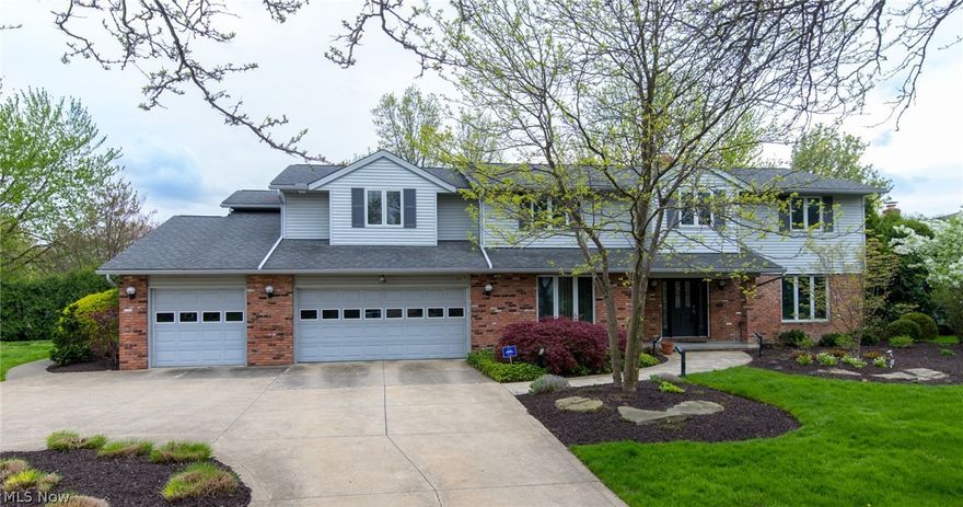 One of a kind home in prime Beachwood location and quiet side street! Excellent traffic flow on first graced by a center hall entry, and to your right, an oversized formal living room with dry bar, extra wide crown moldings ideal for two seating groupings, game table, piano, etc. To your left is an oversized formal Dining Room with hi-line fixture, ample lighting, built in speakers and hardwood floors! The Family Room for gatherings offers high quality, Amish built Cherry cabinetry custom designed by the Owner and display cabinetry and storage for CD's and books! Amazing Kitchen with "Crystal" brand Maple cabinetry, granite counters Sub-Zero, hdwd. floors, cookbook and display shelves, Dacor 6 Burner Gas cooktop and Dacor Double ovens, new (1 year old) Bosch Dishwasher. Bkfst. area leads to patio and very private yard which "sweeps the curve" on the street. Fabulous work area and serving area in kitchen, a dream! Guest suite on 1st with full bath! Second floor has ample sized bedrms wi