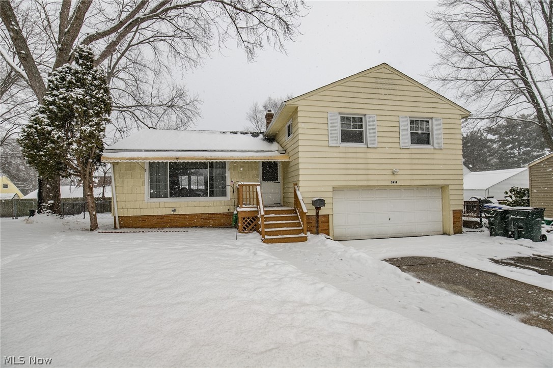 This charming, well kept three bedroom home is located on a quiet cul de sac in the desirable Cuyahoga Manor development. This home has been freshly painted. All three bedrooms have hardwood floors. The master bedroom has an en suite bath and nicely sized walk in closet. The third level features a cozy family room, half bath and leads out to the fenced back yard. Additional features of this home also include newer A/C and electric panel. The Cuyahoga Manor sub division has an optional facility with pool, pavilion and basketball courts just at the end of the street. Perfectly maintained and super clean.Must See.