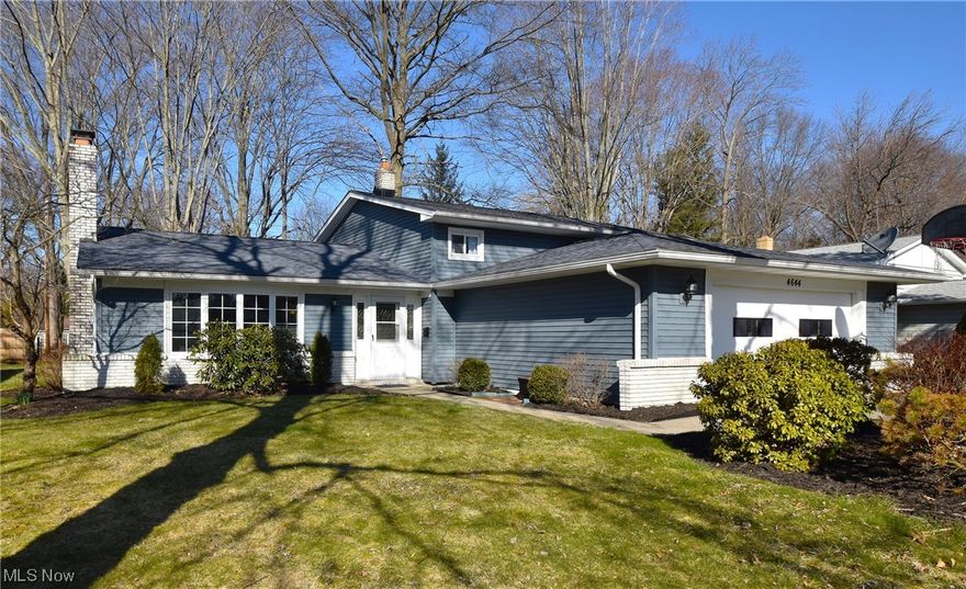 Stunning and move-in ready home on a lovely street, in the North Park Estates of North Olmsted. 4 beds and 1.5 baths! Bright beautiful huge kitchen with skylight and vaulted ceilings, new high-end pantry area added, plus glossy granite countertops. So much room to move! Fresh paint throughout is bright and light, luxury vinyl. Grand foyer greets you upon entrance, which opens to a vast living room with a big bay window and a fireplace! Plenty of room for even the biggest of couch-styles. All windows are newer throughout. Tons of closets/storage everywhere.  Stunning glass folding french-doors into your dining room, which also has slider out to the excellent backyard, featuring a covered patio! The lower level is fully finished and boasts a mega family room, tons of natural light and beautiful built-ins, which also walks out to the back yard. Powder room for guests. Huge and brightly lit laundry/utility/storage room which also walks out the massive 2.5 car garage. Close to shopping +din