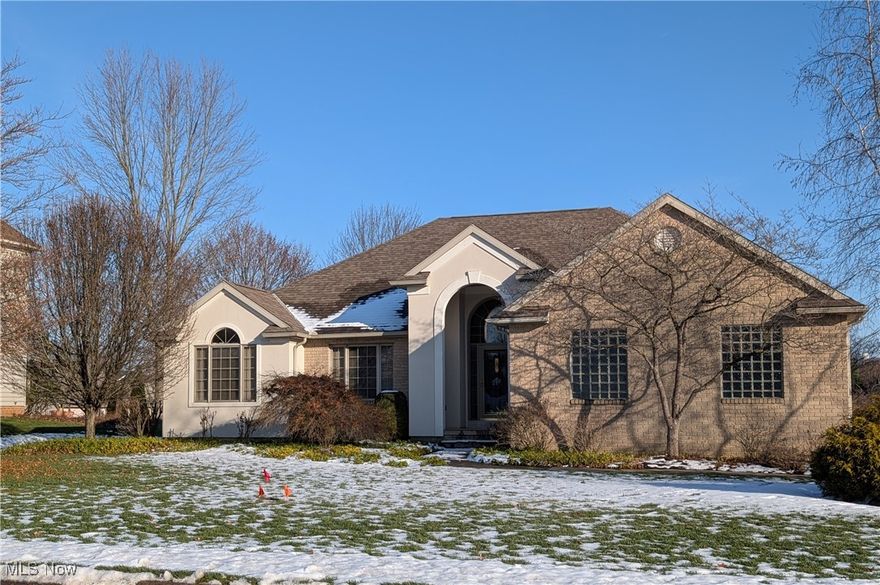 Welcome home to this magnificent ranch, perfectly situated in a highly sought-after school district and a truly wonderful neighborhood. Whether you're downsizing from a two-story or searching for more space for a growing family, this home offers the ideal blend of comfort, style, and functionality. The expansive great room welcomes you with warmth and natural light, anchored by a beautiful fireplace that creates the perfect gathering space. The amazing kitchen features a huge eat-in area and flows seamlessly into a bright sunroom, ideal for morning coffee or casual entertaining. A formal dining room provides an elegant setting for special occasions and memorable dinners. The main level offers three generously sized bedrooms, including a wonderful primary suite designed for relaxation and privacy, including a huge walk-in closet and relaxing master bath with shower and jacuzzi tub. The thoughtfully finished lower level expands your living space with a spacious family room, a dedicated office area, an additional bedroom, and a full bath. Walk-out access to the garage adds convenience and an added level of safety, while the massive workshop and craft room offer endless possibilities for hobbies or storage. Sitting on a beautiful corner lot, the outdoor living space is just as impressive, featuring a magnificent patio with a pergola and lush, meticulously maintained landscaping that truly must be seen to be appreciated. Lovingly cared for over the years, this home shines with pride of ownership and timeless appeal. This is a rare opportunity to enjoy one-floor living, abundant space, and a welcoming community, all in one exceptional home.