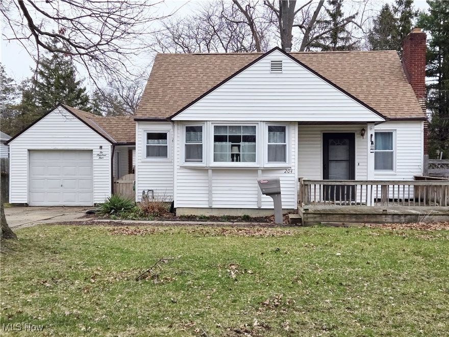 Nestled on a spacious lot, this charming 3 bedroom, 1 bath bungalow offers a delightful blend of classic charm and modern conveniences. As you step inside, you'll be greeted by the warmth of hardwood floors that flow throughout the living room. The centerpiece of this cozy space is a fireplace, perfect for chilly evenings. Adjacent to the living room is a dining room with built-in cabinetry. The kitchen, just off the dining area, is well-appointed and ready for culinary adventures. The first floor boasts two bedrooms with hardwood floors. Ascend to the second floor, where you'll find a large third bedroom with hardwood floors. Ideal for a master suite or a cozy guest room. The full basement offers additional space. It features a second fireplace. The laundry area is conveniently located here, along with abundant storage space to keep your belongings organized and easily accessible. There is a 1 car garage with breezeway to the house. The fully fenced yard provides privacy and a safe haven for both relaxation and play.