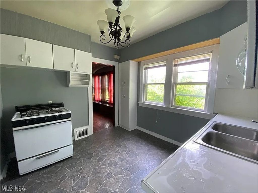 Photo of 18001 Olympia Road, Cleveland, OH 44112 (MLS # 5175410)