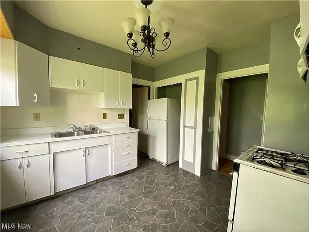 Photo of 18001 Olympia Road, Cleveland, OH 44112 (MLS # 5175410)