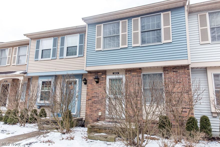 This is a handsomely appointed townhome that has all the updates you are looking for in a home. Kitchen features refaced cabinets in a warm maple finish. New sink, hardware and countertops, stainless refrigerator, and serious 5 burner gas stainless range oven. Kitchen has a pass-through to dining and living rooms. Newer laminate flooring throughout except family room, stairs, and hall. Family room is a walk-out and features newer carpeting and built in bookcases. The furnace and central air were installed in 2010. The hot water tank is newer too! Both bedrooms are nicely sized and have closet organization systems. The master walks into main bath and all walls on second floor are netural white color. The wooded views from all floors is private and beautiful in all seasons. This townhome is FHA/VA ok. The $120 monthly fee makes this home virtually maintenance free. To top it off, this property is being offered with a 1 year home warranty from America's Preferred Home Warranties, paid by