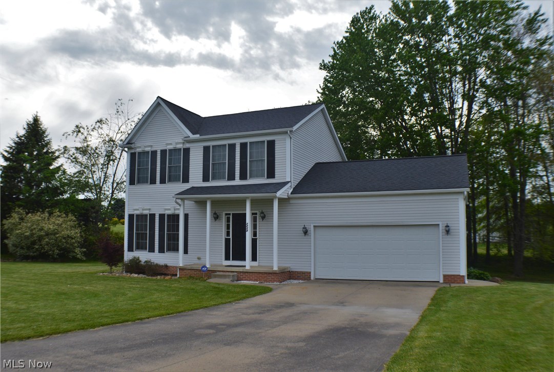 This beautiful home located on Sandy Lake Rd is just minutes away from Kent State University and downtown Kent. The backyard overlooks rolling grass hills and gives a peaceful and private setting to the home owners. With large open living area this is a great home to relax in as well as to entertain guests. If a first floor laundry room is something you are looking for then this home will fulfill that desire. The master bedroom comes equipped with a master bath with his and her sinks and a walk in closet. This home is move in ready and awaiting its new owners!
