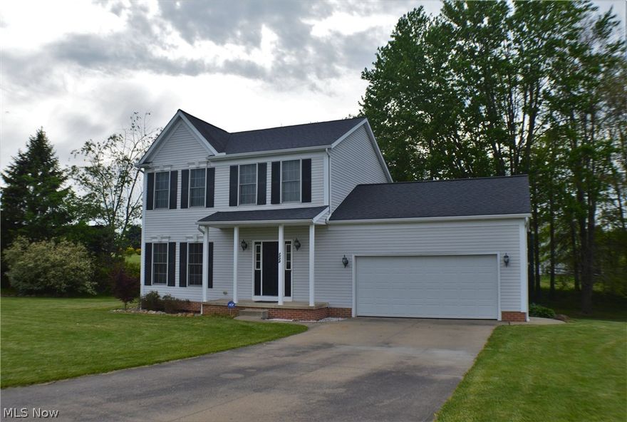 This beautiful home located on Sandy Lake Rd is just minutes away from Kent State University and downtown Kent. The backyard overlooks rolling grass hills and gives a peaceful and private setting to the home owners. With large open living area this is a great home to relax in as well as to entertain guests.  If a first floor laundry room is something you are looking for then this home will fulfill that desire. The master bedroom comes equipped with a master bath with his and her sinks and a walk in closet. This home is move in ready and awaiting its new owners!