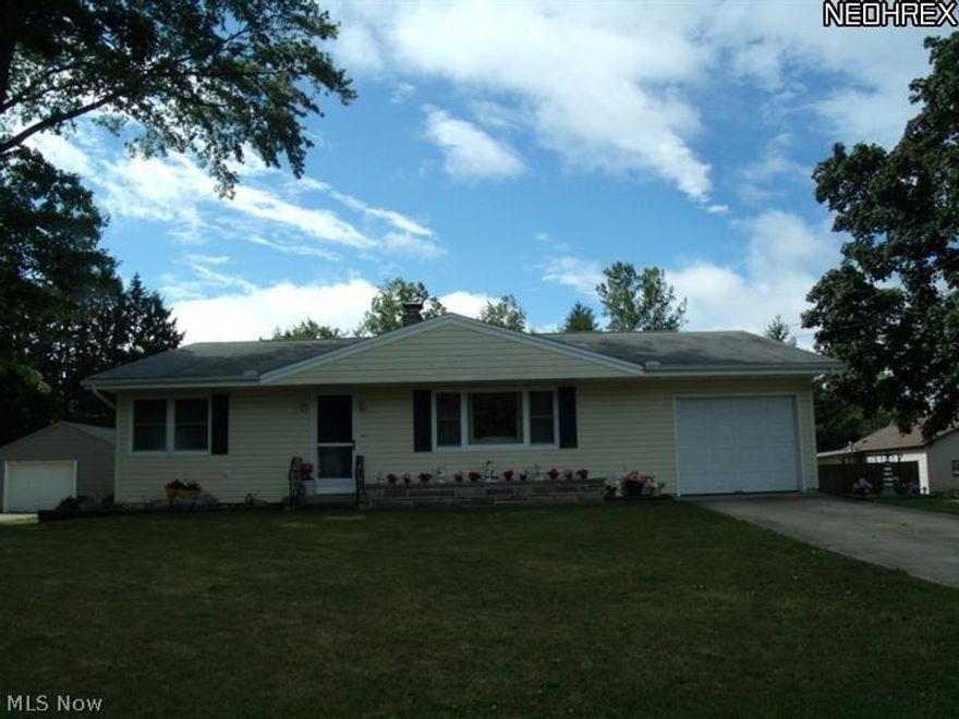 A Happy Home at a price to make You Smile! Seven room solid ranch home on nearly a 1/2 acre in a quiet neighborhood of well-kept homes. Find all the amenities on your wish list, including an updated kitchen with new cupboards, counter tops and flooring. Kitchen opens to a spacious, warm and sunny deck. The basics are all here: new roof in '00, windows in '10, bath updates in '09, hot water tank in '13, fully fenced back yard and attached garage. The partially finished basement could provide extra bedrooms, a rainy day play area, workout space or hobby room. Not one, but two sheds for ideal workshop and storage areas. One shed even has electricity and water! It's Move-In Perfect and irresistibly priced.