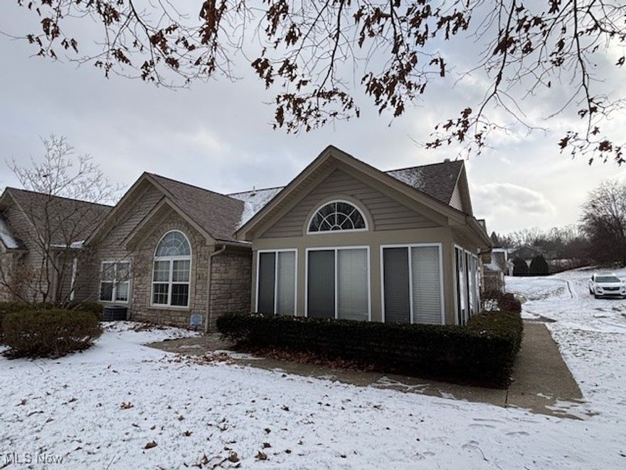 Rare - hard to find, easy condo living - no outside maintenance - move right end! Desirable ranch style (no steps) at Highland Creek Condo Association across from Salem Golf Club. Vaulted ceilings. Open-floor plan has 3 bedrooms and 2 full baths. Instant start gas fireplace in spacious living room. 4-season sun room. Master suite offers walk-in closet and step-in easy shower plus 2 sinks. Convenient laundry room. Includes all appliances. Kitchen has extra wall of updated cabinetry. Granite counter tops. Gas heat, C/A. Oversized 2-car attached garage with added extra cabinets plus also is heated and pull down steps for storage. Community offers a fantastic clubhouse with kitchen and exercise room, and a library. Also, a relaxing inground swimming pool. Reserve the clubhouse for your next private party.