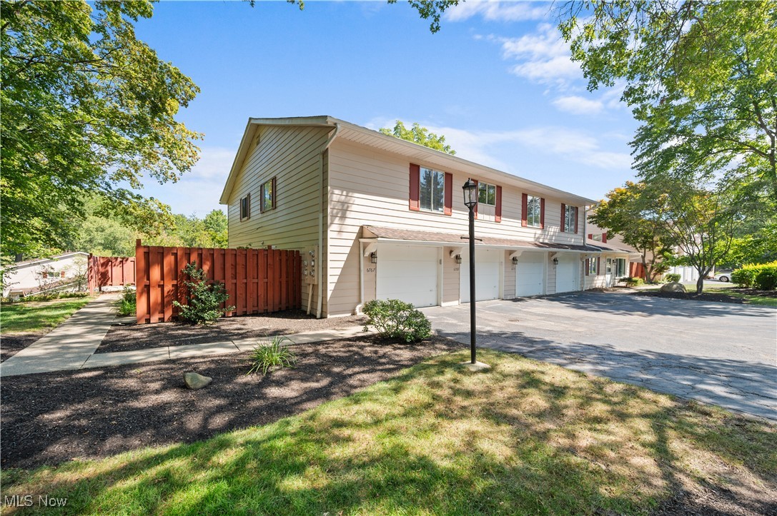 Affordable Living in Beautiful Brecksville! Don't miss this opportunity to own an end-unit ranch style condo in this great community! Tucked away in a peaceful setting, this home features a private, fenced-in patio surrounded by lush trees and greenery - perfect for relaxing or entertaining! Walk up to a bright and sunny open layout with a spacious living/dining room combination. The eat-in-kitchen offers plenty of cabinet space and a generous dining area, ideal for everyday living! Recent updates include newer carpeting and Furnace and C/A (2023) offering comfort and peace of mind. Enjoy the convenience of in suite laundry, two comfortable bedrooms with the master featuring two walk-in closets. Additional highlights include an attached garage with extra storage space - Great Feature! Located within walking distance to charming downtown Brecksville, and just minutes from major highways with easy access to Downtown Cleveland and Akron. Enjoy top-rated schools and all the community has to offer. Schedule your showing and make this your new home!