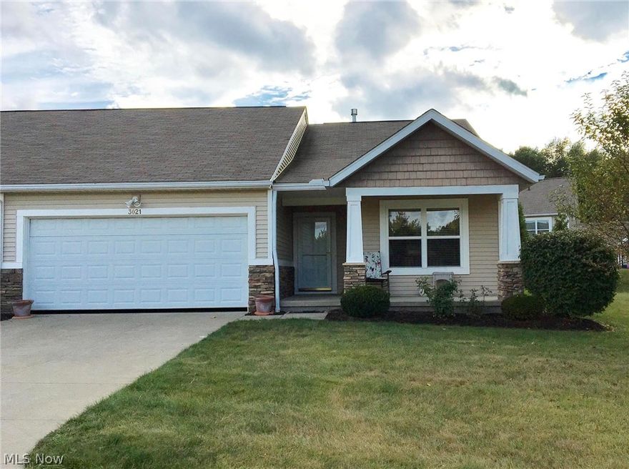 Beautiful Lakemore area 2 Bedroom, 2 Full Bath Ranch Style Condo in Brittany Commons. Since last of the condos that were being built in this development have been sold, this is your opportunity to move in this lovely area. Entertaining would not be difficult by utilizing the Dining area combined with the Kitchen or the Dining Room area that flows into the Living Room. Kitchen with oak cabinetry, laminate counter tops, ceramic tile floor & newer appliances (stove, refrigerator, microwave and dishwasher). Or step out onto the patio with privacy fence on two sides via the sliding glass doors from Dining area. Brand new Carpet (1 month old) in Living Room/Dining Room!  Current Owner has optimized space by adding shelving in Laundry closet to be used as a pantry, adding closet system to walk in closet in Master Bath, adding cabinet in Laundry (between washer & dryer), attached cabinets in 2-car Garage and even adding 2 x 4 Floor planking in "Upment" accessed by pull down stairs in Garage. M