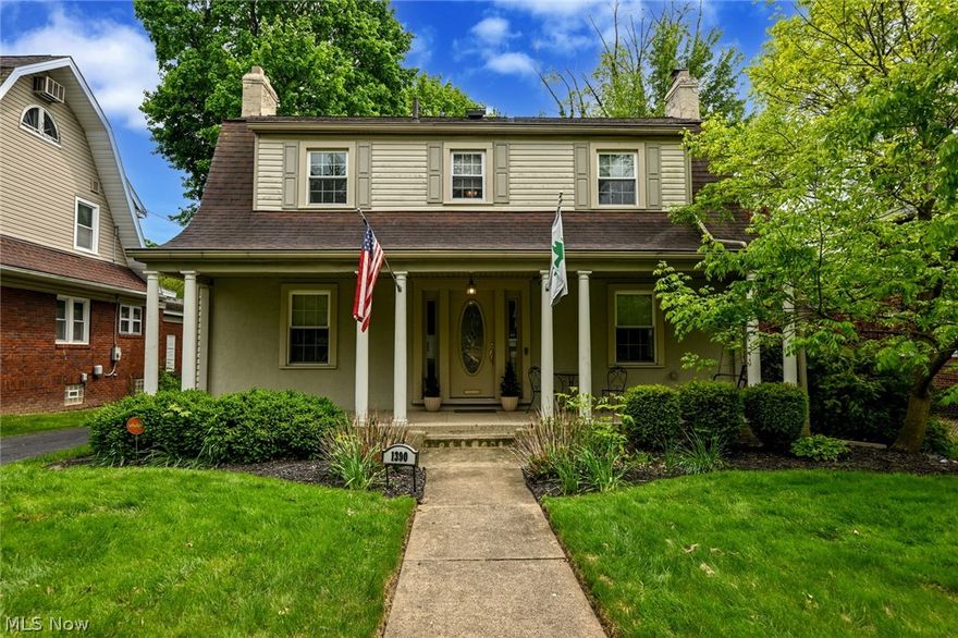 Tired of the cookie cutter homes in cold feeling developments?  Welcome to historically beautiful Delia Ave, in the heart of West Akron!  Classic early 20th century colonials, each with a personality of their own.  Full of warmth and character, this lovely home offers a wonderful mix of high end modern updates and original features!  Stately pillars line the covered front porch, where you'll love to spend endless hours chatting with friends and enjoying the neighborhood.  Welcoming you inside is a timeless foyer, with beautiful archways, handsome wood floors and a gorgeous staircase.  To the left is the formal dining room that will get you excited to entertain!  Wood-look ceramic plank flooring, plentiful cabinetry the reaches to the ceiling, a full set of updated stainless steel appliances, finished off by stunning granite and backsplash complete the kitchen!  Around the corner is a wonderful space boasting a wall of light from the sliders!  Access to the deck, an updated half bath and a 1st floor laundry closet too!  Fantastic french doors take you into the formal living room, offering lots of space and a cozy wood burning fireplace.  Take the elegant stairway to the 2nd floor, to find 3 bedrooms and a nicely updated full bathroom.  The large primary is incredible, with a wall full of original built-ins and 2 additional closets!  There's still a waterproofed and mostly finished lower level!  A huge room that could be a rec room or guest space features it's own fireplace & bookshelf wall.  There is a bonus walk-in closet as well as a 2nd full bath!  Hidden past the bathroom is the utility room.  There's another unfinished storage room with fruit cellar too!  Don't forget the composite deck overlooking the fenced in backyard!  Surrounded by abundant greenery, creating a private space to relax.  Yes, this home does have central A/C!  Full renovation approximately 10 years ago.  Since a new deck in 2024, A/C 2011 & solar panels added.  Get ready to call this home!