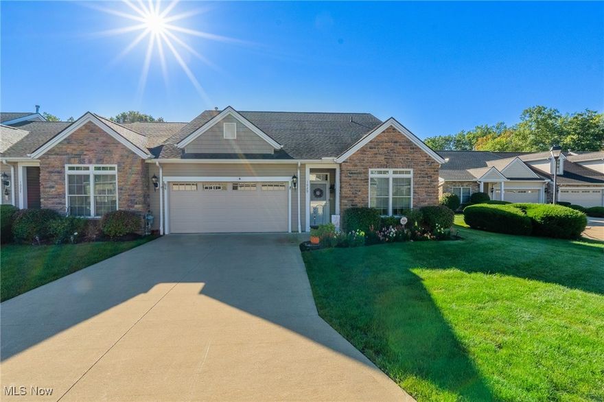 Welcome to Cutter’s Creek, a tucked-away community in South Euclid offering low-maintenance single family homes with thoughtful layouts and generous storage throughout. This 4 bedroom, 3 full bath cluster home features a flexible first-floor plan with a bedroom or office, full bath, open kitchen, great room, sunroom, and primary suite on the main level.

The well-appointed kitchen includes granite countertops, under-cabinet lighting, bar seating, double sinks, and a bonus reach-in pantry. The living room centers around an inviting fireplace and overlooks the sunroom, where large windows bring in abundant natural light. The sunroom opens to an extended, retractable awning-covered patio .

The first-floor primary suite offers a large walk-in closet with two additional large closets, a double vanity, and a full bath. Upstairs, a loft provides additional living space, along with two generously sized bedrooms and a full bath with tub. All three bathrooms are full baths! Additional highlights include a mudroom with laundry and oversized pantry, plus a two-car attached garage. Conveniently located near Euclid Creek Metroparks and just minutes from the Cleveland Clinic.