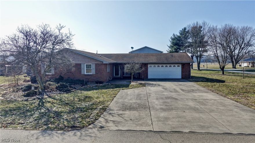 Welcome to 627 Chestnut Street in West Lafayette, Ohio — a beautifully maintained brick home nestled in one of the area’s most desirable neighborhoods. This .34-acre lot offers the perfect blend of convenience and privacy, located close to town while bordering open rural surroundings that provide a peaceful backdrop. From the moment you arrive, you’ll appreciate the pride of ownership. The spacious driveway provides ample parking, ideal for gatherings and everyday living. Step inside and you’ll immediately notice the home’s inviting layout and bright, open feel. The kitchen, thoughtfully remodeled in 2016, serves as the heart of the home. With updated cabinetry, a kitchen peninsula with breakfast bar seating, and appliances purchased in 2016, it’s perfectly designed for hosting family and friends. Major updates include the A/C unit, furnace, hot water tank, and a roof approximately eight years old. The home is also equipped with solar power through Blue Raven Solar for added energy efficiency. This home offers three bedrooms on the main level (one currently used as a convenient upstairs laundry room) and two additional bedrooms in the mostly finished lower level. With two full bathrooms, including a spacious owner’s suite with a large closet and private bath, there is room for everyone to feel comfortable. The lower level expands your living space with an additional family room area perfect for movie nights or entertaining. You’ll also find a dedicated craft room, an additional workshop space, and abundant storage throughout. The basement also provides easy access to the attached garage for added convenience. Outside, enjoy an enclosed patio, the perfect place to relax and unwind. An insulated and heated woodworking shop offers a fantastic space for hobbies, projects, or storage. If you’ve been searching for a well-cared-for home with modern updates and flexible living space, 627 Chestnut Street is ready to welcome you. Schedule your private showing today!