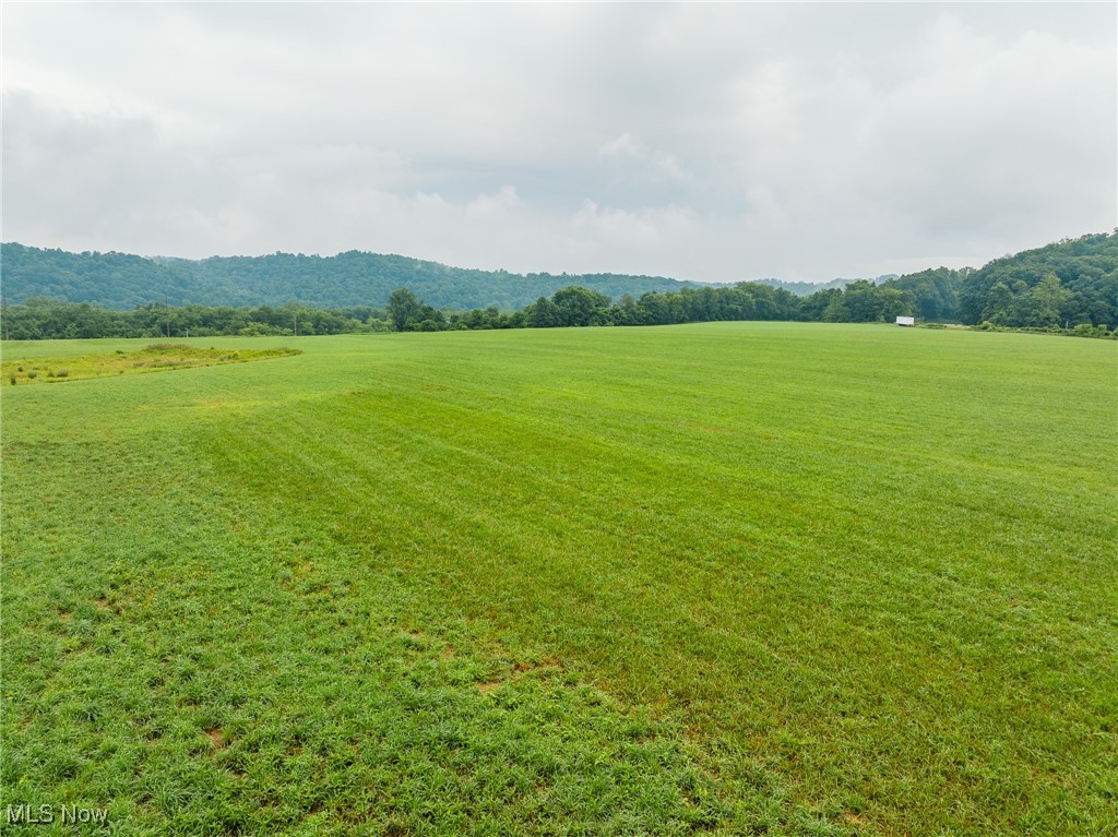 Prime 70.54-Acre Commercial Tract Between Millersburg & Killbuck. Exceptional development opportunity with excellent visibility and access from a main highway. This level, cleared property is ready for your plans and offers public utilities, making it ideal for a wide range of uses. High-traffic location with great road frontage—perfect for commercial, industrial, dining, retail, or mixed-use development. The southern portion of the property also offers potential for residential development, adding flexibility to your investment strategy. Part of Parcel #0800585002. Taxes to be determined upon completion of survey.