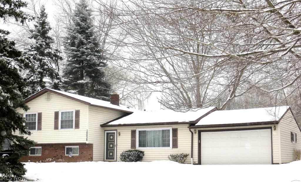 Meticulously Maintained is this Pristine 3 Bedroom, 1.5 Bath 3-Level Split on Wooded Lot. Many Updates! Vaulted Living Rm w/Upgraded Carpet. Updated Cherry Kitchen and Laminated Wood Floor. Tile Backsplash, Stainless Steel Appliances. Pantry w/Pull out Shelves and Soft Close Drawers. Plenty of Recess and Under Cabinet Lights. Separate Dinette or Informal Dining Rm. Sliding Glass Doors to Patio and Wooded Lot. Great for Entertaining or Playtime. Upstairs you will find 3 Spacious Bedrooms w/Carpet over Hardwood Floors, Updated Main Bath w/Ceramic Tile Floor, Designer Tile Wall, and Linen Closet. Lower Level Features Powder Rm and Family Rm w/Upgraded Carpet. Hot & Cold Water Connection for Wet Bar or Desk & Computer Area. 2 windows let the sunshine in! Laundry Rm w/Washer, Dryer, Glass Block Windows & New Utility Tub. Basement has Waterproof System & Sump Pump. A two car attached garage and nicely landscaped yard make this a real deal! New: Furnace, C-Air, Hot Water Tank and Freshly Pa