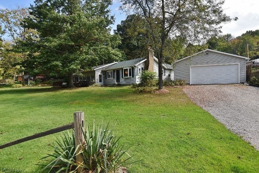 Nothing to do but just move in, kick back and enjoy the magnificent sunsets from this nearly waterfront Atwood Lake ranch home on 5 private lots (no lease). The owners have taken great care of the home & many recent improvements include roof and gutters (2016), new flooring, fresh paint, updated electrical service, hot water heater, fenced back yard & remodeled outbuilding (man cave). This great one floor living home provides a great floor plan with incredible lake views from the sun room, living room, dining area, screened porch and deck. Open format kitchen, living rm & dining rm. Kitchen is fully appliance & features 2 skylights. For your nautical toys, two quality dock slips are included and just a short walk from your door. The home features 2 spacious bedrooms and 2 bath. The master features a private bath with jetted tub. The huge 23x13 sun room and 26x13 living/dining room provide incredible space for entertaining family & friends along with a large screened porch and deck. A h