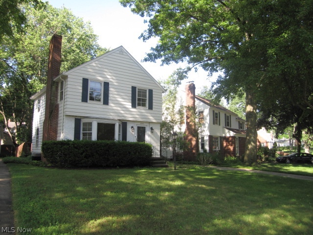 Traditional Colonial in prime location, West of State Rd in the Falls. Beautiful hardwood floors throughout. Extremely large living room features charming fireplace/mantle and built-in bookshelves on both sides. Kitchen is updated and includes stainless, flattop stove and dishwasher, newer ceramic floor. Entire first and second floor has been freshly repainted with neutral and fashionable colors. Formal dining room has double door sliders to massive wood deck. This deck features a convenient wheelchair ramp in an unobtrusive location in back yard. There is a convenient half bath on 1st floor. Enjoy Cuyahoga Falls utilities and Amenities like our neighborhood parks. This home is close to both a community bird sanctuary and The Metro Parks Gorge Park.