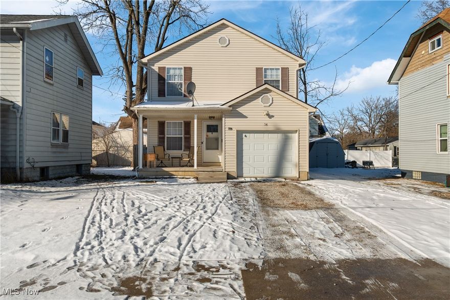 Welcome to this charming and well-maintained 3-bedroom, 1.5-bath colonial nestled in a quiet Akron neighborhood. Recently built in 2005, this home offers an array of upgrades including a Ring doorbell (2021), Smart thermostat (2021), Smart light switches (2021), Washer & Dryer (2021), HVAC installed (2021), Gas HWT (2023), Fridge (2025), Range and Microwave (2023), Dishwasher (2022), Bathroom upgrades (2022), City of Akron even installed a new water meter (2025). This home offers a highly functional layout with comfortable living spaces and timeless appeal! The main level features a bright living room that flows into the dining area and kitchen, perfect for everyday living and entertaining! The kitchen offers ample cabinetry and counter space, and is complete with those updated stainless steel appliances! A convenient half bath completes The main floor. Upstairs, you’ll find three generously sized bedrooms each with ample closet space and the updated main bath that doubles as an ensuite to the primary bedroom!  The lower level provides a partially finished space that would make a great space for a rec room or home gym! The unfinished portion of the basement provides ample storage space, laundry area with opportunity to finish. Out the sliding glass door, enjoy a private, fully fenced in backyard ready for summer evenings, pets, or outdoor gatherings! The attached one-car garage adds convenience and additional storage! Located close to shopping, dining, schools, and major routes, this home is a fantastic opportunity for homeowners or investors alike! Move-in ready with room to make it your own. Don’t miss your chance to see it! Call to schedule a tour!