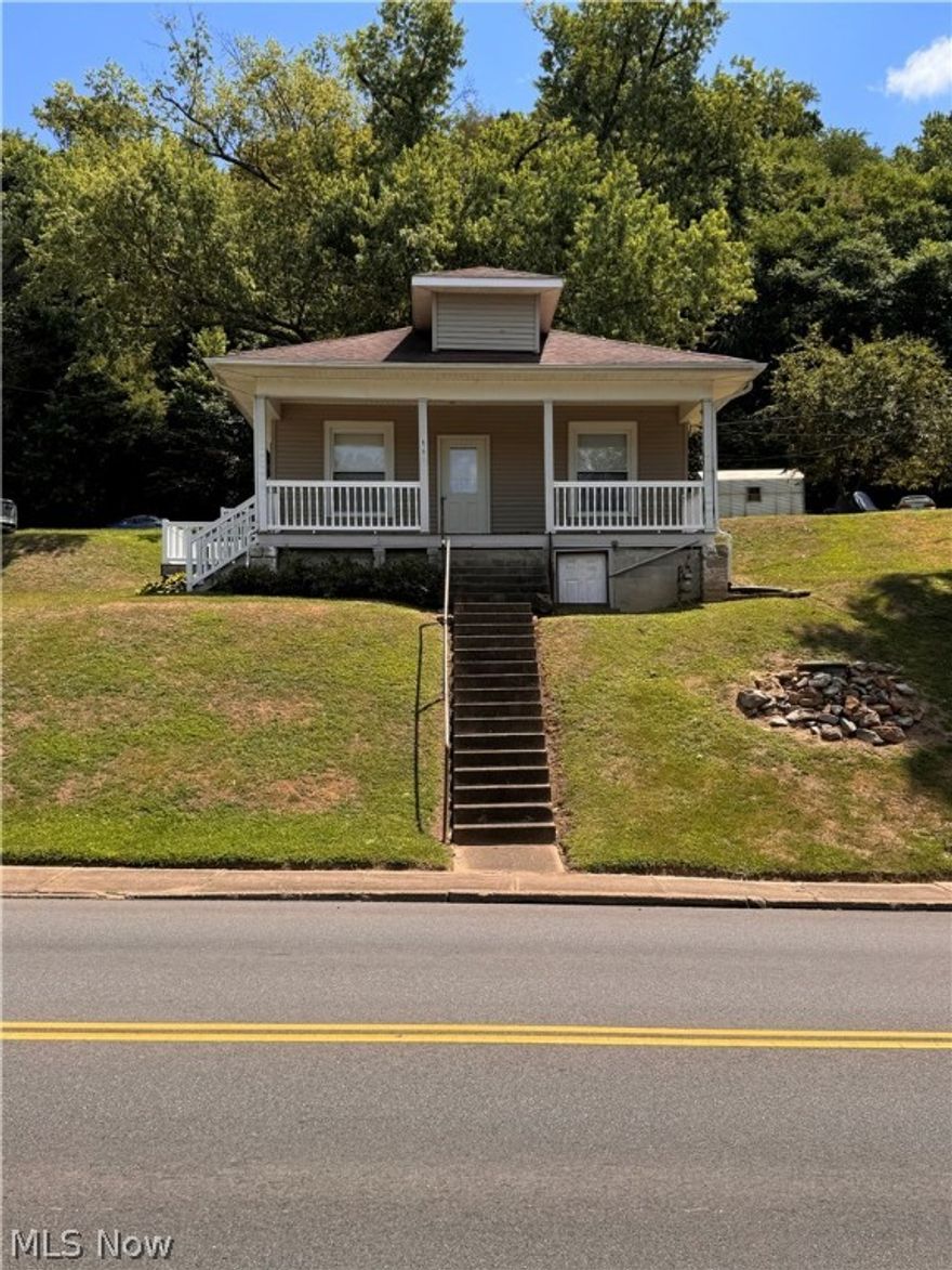 This move-in ready home, located in Zanesville City Schools, has 4 parcels included with a riverfront area too! The current owner lived here for over 40+ years! There are hardwood floors, replacement windows and the refrigerator will remain! It has a dry, walkout basement that would be great for additional storage area! Parking is in rear of the home and can be along side the road across the street. This would make a great investment property as a rental for additional income or a wonderful home for a first time home buyer!  Call today!