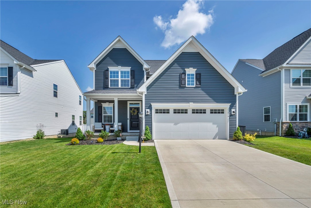 Truly a better-than-new opportunity awaits with this magnificent, newly built & extensively upgraded home where all the extras have already been completed for you! From the fully landscaped yard & custom window treatments to the beautiful full vinyl privacy fence & extended stamped concrete patio, this home is move-in ready with every detail thoughtfully finished. A newly added custom entertainment wall w/electric fireplace brings warmth & style to the spacious great room, while upgraded spindled railings add architectural charm throughout. Light-filled interior features today’s most desirable colors & finishes, 9-foot ceilings on the main floor, upgraded recessed lighting. Gourmet kitchen will impress any cook with its 42" upgraded cabinetry, sleek countertops, desirable pantry, & open flow into the large gathering space—perfect for hosting or everyday comfort. There’s no carpet on the main level—just durable luxury vinyl flooring for easy maintenance & modern appeal. Luxurious owner’s suite offers a true retreat w/dual walk-in closets & private bath featuring comfort-height dual sinks. Second-floor laundry adds convenience to your daily routine. Full deep basement includes a full-size egress window & rough plumbing for a future bath, and framing has already begun—offering a head start on finishing to suit your needs (wood materials to remain). Situated on a premium lot in one of the area’s most sought-after communities, this home blends luxury, function, & location. The current owner is being transferred and will deeply miss this exceptional home where no expense was spared. An incredible opportunity—schedule your private showing today!