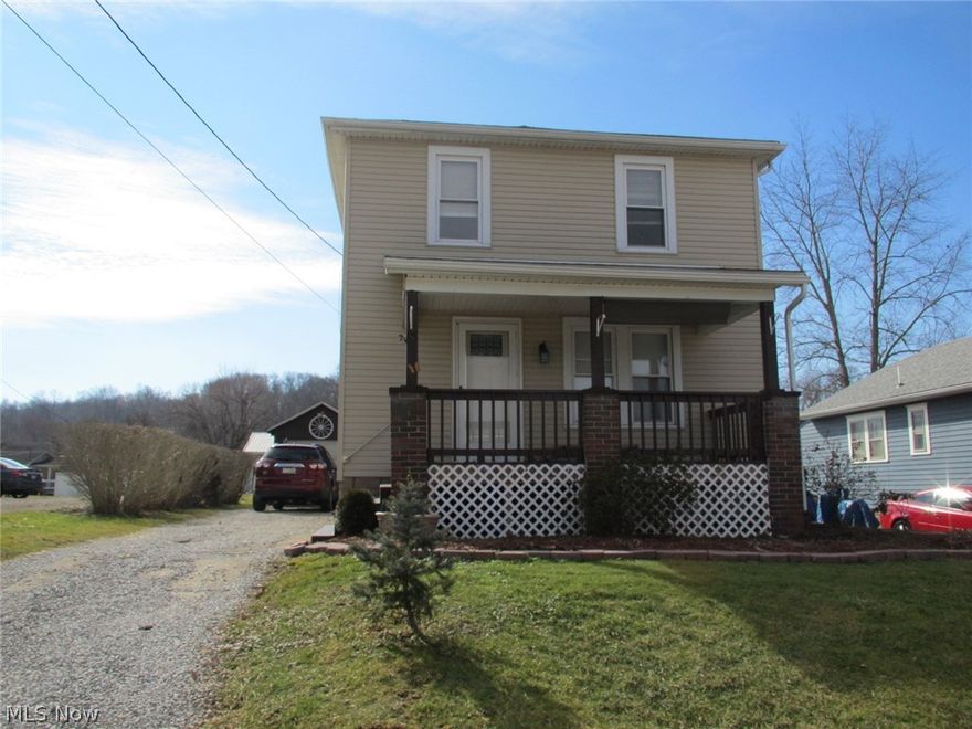 This would make a great starter home. New flooring in kitchen, dining room and both remodeled bathrooms. There is a full bath on main floor and on second level. Large Livingroom with ornamental fireplace. Both bedrooms are on second floor. Large master bedroom has two closets. House has all newer windows.
Basement has laundry hook up. Newer high efficiency gas furnace and hot water tank. Electric box and a lot of the electric wiring have been upgraded. New survey has been completed and corners are marked. There is a one car garage.