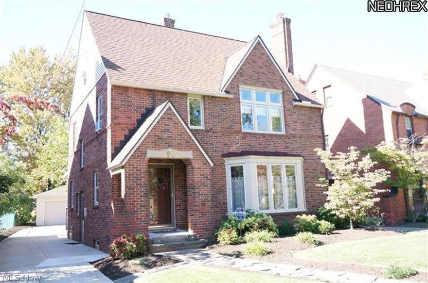 Absolutely Charming All Brick Colonial w/Tudor Elements! CHECK OUT THE 360 DEGREE PANORAMIC VIRTUAL TOUR!!!  Large Light-Filled Living Room w/ WBFP & Leaded Glass Windows. Formal Dining Room w/ Leaded Glass Built-ins. French doors lead to a Professionally Landscaped Yard. Paver Patio, Cozy & Private w/ an Evergreen Hedge. Established Perennial Gardens. Hearty Hydrangeas Front & Back, Hostas, & Spring Peonies line the Fence. Low Maintenance! Gleaming wood floors throughout. Great Updated Eat-in Kitchen w/ Maple Cabinetry, Granite Countertops, & SS Appliances. 3 Large Bedrooms on 2nd Flr w/ an Updated Full Bath. Access to Balcony from Hall on 2nd. 4th Bedroom on 3rd Flr w/ Additional Full Bath. Partially Finished LL that has been Waterproofed w/ a Sani Dry Basement Air System. Newer Roof, Boiler, Concrete Drive, 2 Car Garage, Glass Block Windows, Main Electrical, & Much More! Home Warranty Included! Minutes from Cleveland Clinic, UH, Case, JCU, & University Circle Area Attractions!