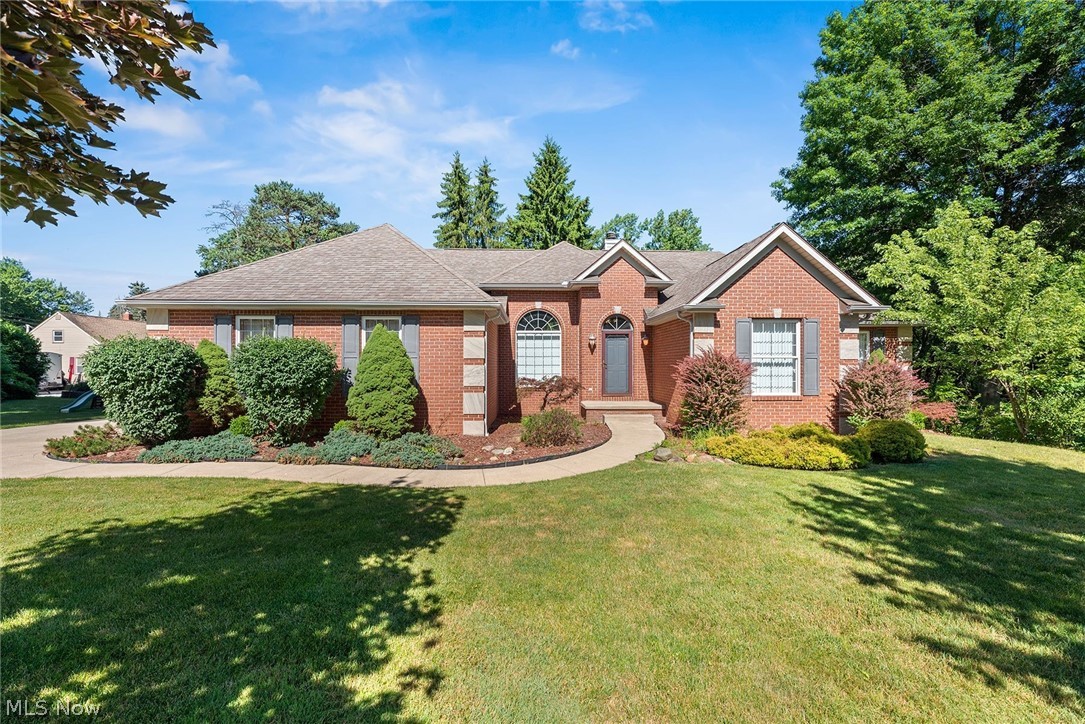 This is the one you’ve been waiting for! Custom built ranch style home with open floor plan is enhanced by the vaulted ceilings! Brick front exterior and welcoming entrance lead to the great room that is designed for entertaining. Stone fireplace and wood floors enhance the classic contemporary style. Spacious kitchen with lots of storage and counter space leads to first floor laundry and half bathroom; the kitchen counter-bar has lots of seating perfect for get togethers or for buffet style serving that is open to the dining room. Private office and sunroom with 2-sided deck complete this side of the over 2,000 sq ft home. 3 large bedrooms are on the other side of the home with guest bathroom plus double sinks. Owner’s suite feels like a retreat with soaking tub, and separate shower, 2 separate sinks and large walk-in closet. Every detail was thought of when building this one owner home (blueprints on dining room table). The basement is massive and just waiting for you to finish it to