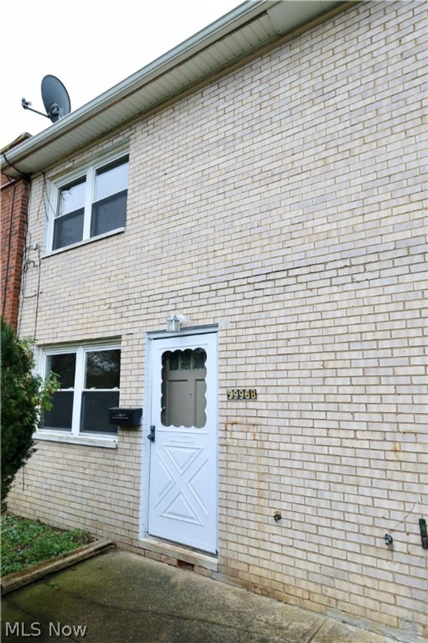 Welcome home to this all brick townhouse!  Updated kitchen offers, newer cabinets & countertops, brand new refrigerator & stove (2022), plus washer, dryer, & washtub.  Spacious family room with laminate flooring.  Upstairs you will find refinished hardwood flooring, newer closet doors, & updated bathroom.  Nice size bedrooms.  Updates include: new furnace & hot water tank (2022) - fresh paint throughout home.  Private patio area, playground area, and private parking.  This unit offers central a/c which only 1 of a few units that offers it.  No HOA or Maintenance fees.