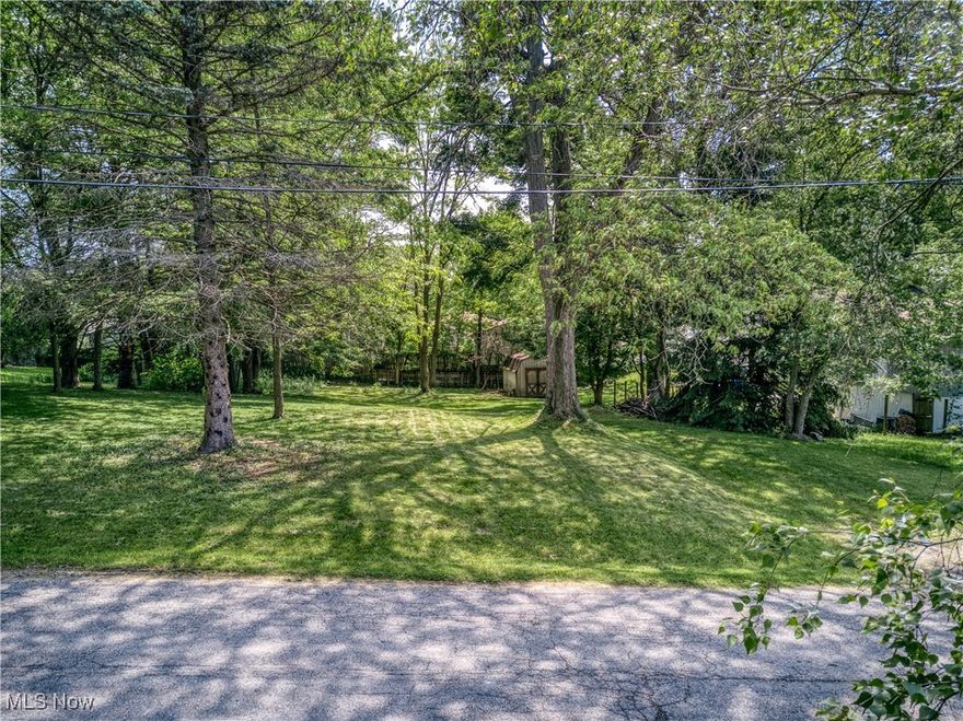 Have you been searching for your next home and having a difficult time in the market? Build your dream home in Cuyahoga Falls! Serene park-like setting at this .378 acre property. Located minutes from all of your Falls favorites yet tucked away on a quiet dead end street. Current topography would make for a perfect walk out style home. Driveway placement is already established and all utilities are available at the street.  Zoned R-4, with minimum city required building setbacks at 30' - Front, 5' - Side, 25' - Rear. Buyers are responsible for their own due diligence in design and analysis.