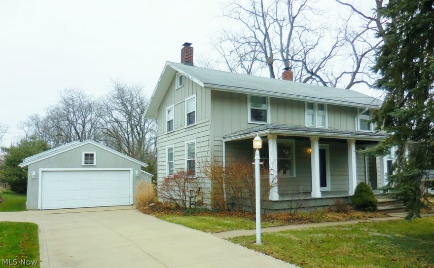 Very charming and updated home, fireplaced living room with built-in bookcases. Dining with refinished wood floors, eating area and kitchen with tile floor,  kitchen with oak cabinets and newer stainless steel appliances. Rec room with walk out to brick patio. Nice yard with tree line at back of property. 2 car garage + 20x30 outbuilding attached to garage and heated. Newer windows and central air.