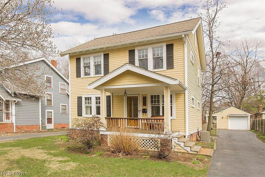 Super Charming, Light & Bright Front Porch Colonial On Demand Street!  Features Hardwood Floors & Natural Wood Trim. Living Room w/Corner Fireplace. Formal Dining Room w/Original Leaded Built-In Cabinets. Updated Eat-In Kitchen w/Granite Counters & Subway Tile Backsplash. 3 Bedrooms on 2nd Plus Updated Full Bath.  Bonus Sun Room at Top of Stairs. Great, Recently Finished 3rd Floor. Deep Fenced Yard. Close Proximity To University Circle, Case , Univ Hosp & Clinic!