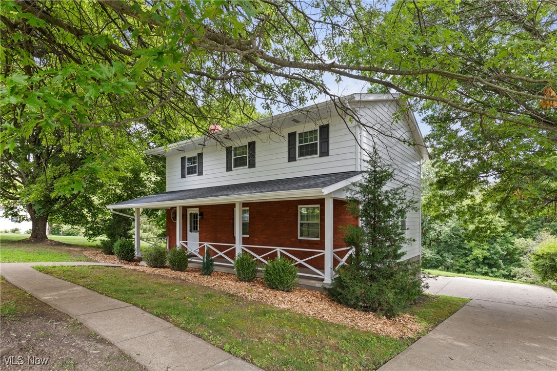 Why go through the hassle of building when this TURN KEY - COMPLETELY REMODELED home could be yours! Nestled in a picturesque and highly sought after neighborhood outside of city limits, 66819 Anna Drive is the perfect place to call home. Step inside and you will be blown away by the luxurious updates!
Step inside and you will find a large living room and a formal dining room with serene views of the private backyard. The cozy den with a beautiful wood burning fireplace is enhanced by brand new French doors (fiberglass) that open onto a freshly stained deck—perfect for enjoying your morning coffee or entertaining guests. The heart of the home—a stunning new custom kitchen—boasts white shaker cabinetry, Cambria quartz countertops, a subway tile backsplash, a large Kohler stainless steel sink, and a full suite of new Frigidaire stainless steel appliances
Upstairs, you’ll find four well-appointed bedrooms with spacious closets, including a spacious primary suite with its own beautifully renovated en-suite bath. All bathrooms feature new elegant finishes including custom vanities, Delta fixtures, Kohler toilets, and stylish lighting. The main hall bath includes a tub/shower with glass doors, while the primary bath offers a sleek walk-in shower.
- Interior upgrades include:
• New luxury vinyl tile flooring throughout
• New carpet on stairs
• Fresh paint throughout the home
• Updated ceiling light fixtures in every room
• New laundry tub
- Mechanical and structural improvements:
• New heat pump
• New electrical outlets
• New Rheem hot water heater
• New aerator in septic system
• New architectural shingle roof
• New exterior paint, shutters, and light fixtures
• New insulated Raynor garage door and opener.
This home combines thoughtful renovations with warm, classic charm—all set on a spacious lot with mature trees and privacy. Don’t miss your opportunity to own this lovingly updated home that’s ready to be enjoyed for years to come!