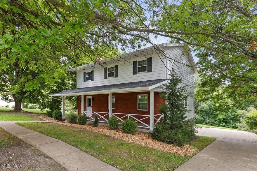 Why go through the hassle of building when this TURN KEY - COMPLETELY REMODELED home could be yours! Nestled in a picturesque and highly sought after neighborhood outside of city limits, 66819 Anna Drive is the perfect place to call home. Step inside and you will be blown away by the luxurious updates! 

Step inside and you will find a large living room and a formal dining room with serene views of the private backyard. The cozy den with a beautiful wood burning fireplace is enhanced by brand new French doors (fiberglass) that open onto a freshly stained deck—perfect for enjoying your morning coffee or entertaining guests. The heart of the home—a stunning new custom kitchen—boasts white shaker cabinetry, Cambria quartz countertops, a subway tile backsplash, a large Kohler stainless steel sink, and a full suite of new Frigidaire stainless steel appliances

Upstairs, you’ll find four well-appointed bedrooms with spacious closets, including a spacious primary suite with its own beautifully renovated en-suite bath. All bathrooms feature new elegant finishes including custom vanities, Delta fixtures, Kohler toilets, and stylish lighting. The main hall bath includes a tub/shower with glass doors, while the primary bath offers a sleek walk-in shower.

- Interior upgrades include:
 • New luxury vinyl tile flooring throughout
 • New carpet on stairs
 • Fresh paint throughout the home
 • Updated ceiling light fixtures in every room
 • New laundry tub 
- Mechanical and structural improvements:
 • New heat pump
 • New electrical outlets
 • New Rheem hot water heater
 • New aerator in septic system
 • New architectural shingle roof
 • New exterior paint, shutters, and light fixtures
 • New insulated Raynor garage door and opener.

This home combines thoughtful renovations with warm, classic charm—all set on a spacious lot with mature trees and privacy. Don’t miss your opportunity to own this lovingly updated home that’s ready to be enjoyed for years to come!