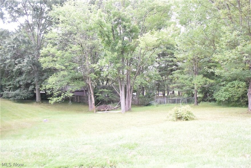 VACANT LOT. FRONTAGE- 149.36, REAR (NORTH) 152.31, LEFT 134.55 (WEST), 102.84 RIGHT (EAST). CURRENTLY ZONED MULTI FAMILY.  FACING 1625 HIBBARD THE LAND IS TO THE RIGHT. BUYER IS RESPONSIBLE TO DO THEIR DUE DILIGENCE  TO CHECK WITH THE CITY OF STOW IF THE PROPERTY IS BUILDABLE FOR THEIR STRUCTURE. VISUAL PROPERTY STAKES.