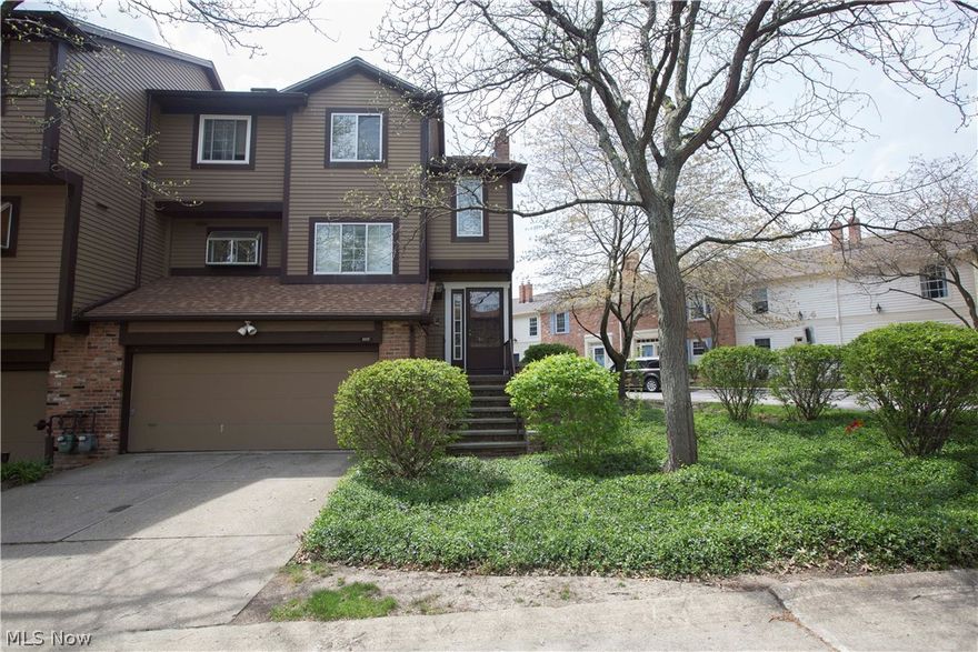 A light and bright townhouse with many highlights! On the main floor you will find a spacious 20x15 living room with laminate flooring, built-in shelving and entertainment center, and sliding glass doors to the balcony. The laminate flooring continues into the eat-in kitchen that offers plenty of cupboard and counter space, newer stainless appliances including the dishwasher, microwave, and refrigerator, plus a casual dining area, and pantry. The main level is complete with a half bath and access to the attached 2 car garage. On the second floor you will find two bedrooms and 2 full bathrooms, including the master suite with a private full bathroom. The second floor loft is currently being used as a home office and could easily be converted into a third bedroom as desired! The finished lower level offers windows for even more natural light, a brick fireplace, and plenty of additional living space. A home warranty is included. This townhouse offers a great location as an end unit only m