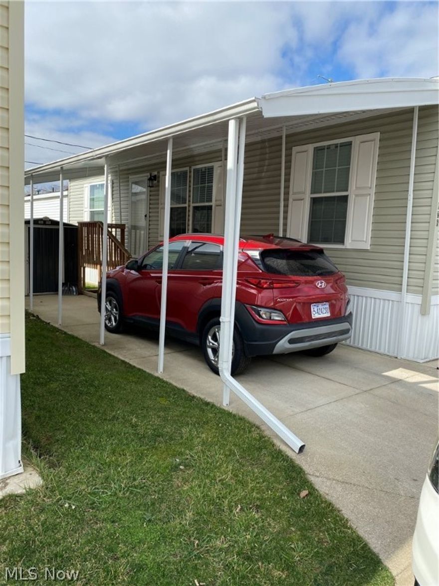 55+ community, Parma Estates' very own "breath of fresh air"! This wonderfully maintained 2021 manufactured home is the "move-in ready"
sanctuary you've been looking for. One of the largest floor plans in the community. 3 bedrooms - 1 bedroom
currently being used as an office. With grey vinyl flooring, plenty of natural light, and high ceilings, you'll feel relaxed and
renewed. This quaint 55+ community is ready to welcome you home to sixth street! Pull up into the carport under your
very own, newly installed awning. This particular home is a rare-opportunity as it comes with a 1 year home warranty
provided by America's Preferred which will cover all of the 2021 appliances. This gem definitely has that "must-see"
factor, so schedule a tour today. It's a convenient location within minutes of I-480 and I-77, and in proximity to
downtown, shopping and more!