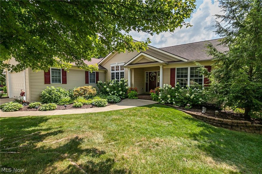 A must see to appreciate. Part of Eaton Estates.You have use of the pool, tennis courts and more. Superb craftmanship,one of a kind home, many interior features that set this home apart from others on Nicole Lane. Upon entering the home, please notice the spacious tile front porch, woodwork, dining room ceiling, solid interior doors, 10' ceilings, heated floor in Master Bath, heated garage. Take notice of the rear of the home. A wooded sanctuary. Wait until you see the birds gather at the feeder, please sit out on the deck(s), while there, and take it all in. This is a split ranch, 2 bedrooms & full bath on one side of the home that can double as an in-law suite. The master suite, 15' x 19' is a WOW.  A spa like bath, which includes a jacuzzi tub, a tile shower heated floor,and a large master closet, all on the opposite side of the house. Gorgeous cherry kitchen w/granite, soft close drawers, rubbish bin & more. Dinette overlooks the wooded rear yard.Wait until you see the walk out low