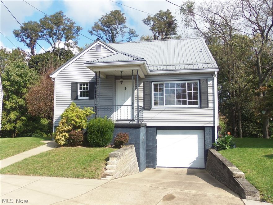 CHARMING CHOICE IN THE HEART OF WEIRTON HEIGHTS... close to Rt. 22 and all conveniences.  Take a look at this 3 bedroom charmer located on a cul de sac and offering a comfortable living room, eat-in kitchen, 2 bedrooms and full bath on the main level and an upper level featuring a generously sized 27x17 bedroom. There's a large deck overlooking a wooded backyard that has access from the kitchen area or first floor bedroom, 1 car garage and more!