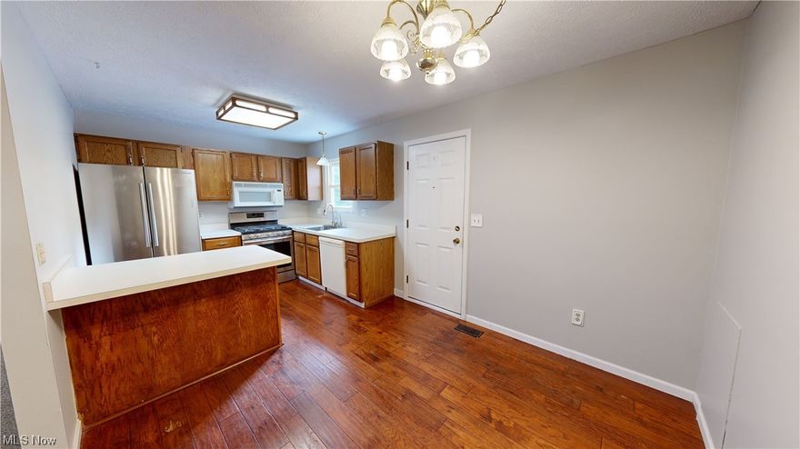 Location, Location, Location! Close to countless amenities and freeways. This adorable condo is nestled in the back of Franklin Commons condo development. This beautiful three bedroom, two bath, end unit boasts a first floor master bedroom, first floor master bath, and a first floor laundry. Entire unit has been freshly painted. The eat-in kitchen with hardwood floors comes equipped with all appliances,  a reverse osmosis water system, lots of cabinet and countertop space including a peninsula! The second floor is home to two generous sized bedrooms and full bath. Enjoy a warm cup of cocoa while relaxing on your stone paver patio! Plenty of storage space here! 1 car attached garage! Don't wait too long, schedule your appointment today!