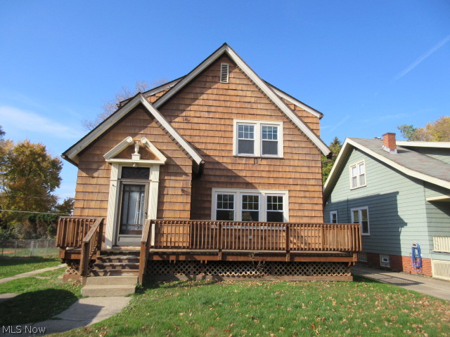 Good Curb Appeal with this 3 bedrooms, 1.1 bath colonial. Large living room leads into the dining room. Beautiful natural woodwork throughout. Good size eat-in kitchen. Half bath on first floor. Balcony off bedrooms up. Full, part finished basement with rec room and bar. Glass block windows. Fenced yard and a 2 car detached garage. Deep lot. This one will go fast!