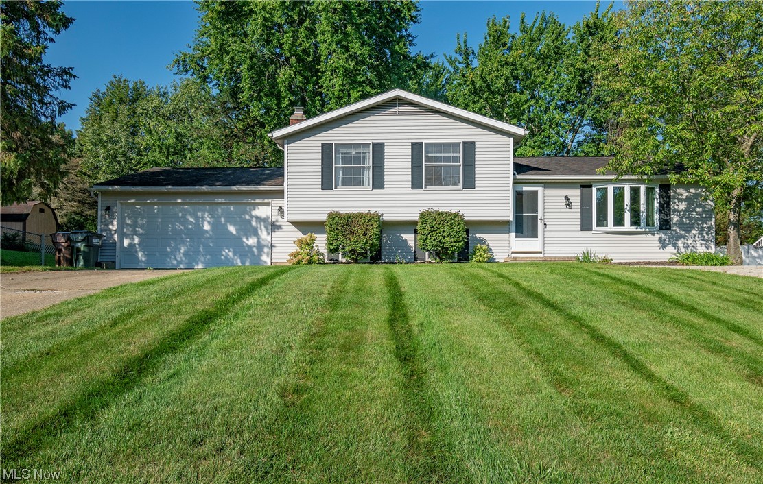 Welcome home to 4684 Red Willow Road! This beautiful move-in ready split level is just what you've been looking for! Boasting a fenced-in backyard and updates throughout, this will not last long. Enter into your cozy living room and continue into the dining room providing access to the back deck. This modern kitchen comes equipped with 2019 stainless steel appliances and granite countertops. Venture upstairs to find all new flooring in the three great sized bedrooms and full bathroom. The lower level is great for movie night, featuring a large family room with a fireplace! You will also find a half bath, laundry room, and access to a 2 car garage. Enjoy your morning coffee on the deck of this private fenced-in backyard. New retaining wall in the front yard. 1 yr home warranty provided for your peace of mind. Garbage disposal 2023. Washer 2016. Don't miss your opportunity to own this home! Schedule your private viewing today!