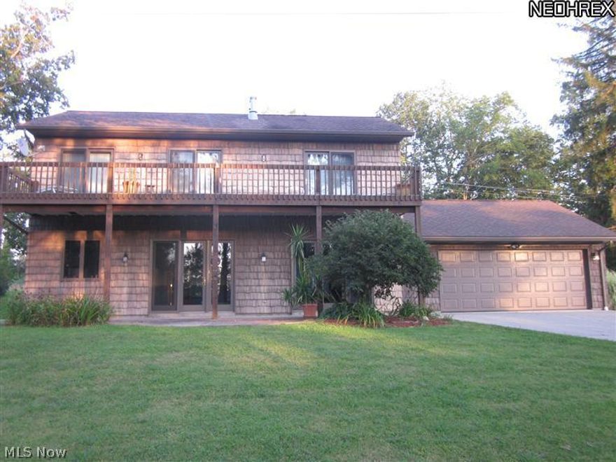 This 3 Bedroom 2 1/2 bath Beautiful Lake Home has exclusive 8' tall patio doors with a multi-point locking system.  There is a fireplace in the master bedroom and a wood mantel fireplace separating the dining area from the living room. You can see the lake from every room in the house.  There is a large boat skip made by EZ Dock for your boating pleasures.  There is a large garage with storage area and a dry space installed under the deck.  Annual lease is $2406.00 MCWD  $12.00