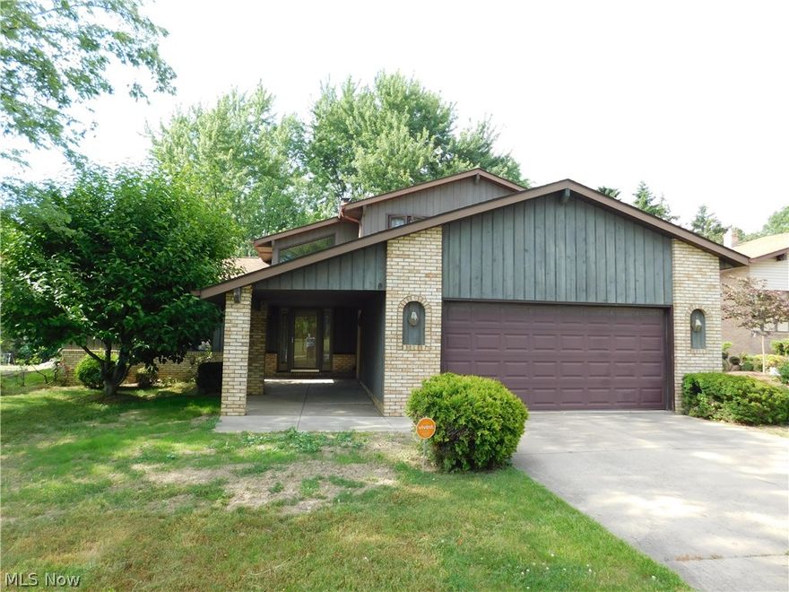 You won't recognize this beautiful split level four BR home in Richmond Heights on private cul-de-sac street since last time on the market.  A myriad of fabulous updates within the the past 14 months by the homeowner!  Enter the new front door into the large vaulted foyer with open view to the left of vaulted LR and DR with new flooring or hallway to the right with first floor laundry room, spacious first floor BR with new flooring and full bath with updates as well!  To the rear of the home, the eat-in kitchen with new fixtures, S/S appliances and countertops flows nicely to the family room with arched brick FP, new flooring and doors to rear deck.  Three BRs up with new carpeting, fully updated hall bathroom, great room sizes, and master suite with walk-in closet and master bathroom.  Additional space in the basement with new finished recreation room and plenty of storage space.  Newer furnace, recently painted throughout and so much more!  Hurry on this one!  Welcome Home!