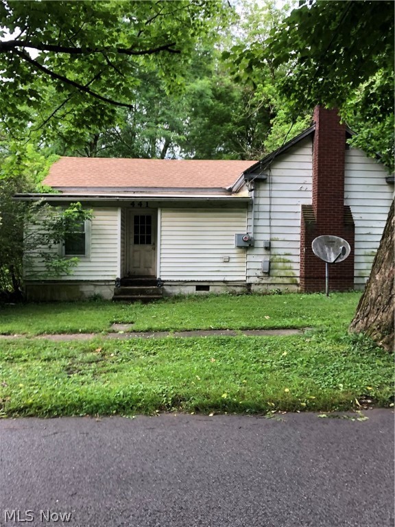 Affordable fixer upper or rental 2 bedroom ranch on the edge of town. This home includes a 2 car detached garage and a nice big lot. Hardwood floors throughout. New roof in 2018. Selling as is. Seller is retaining mineral rights.
