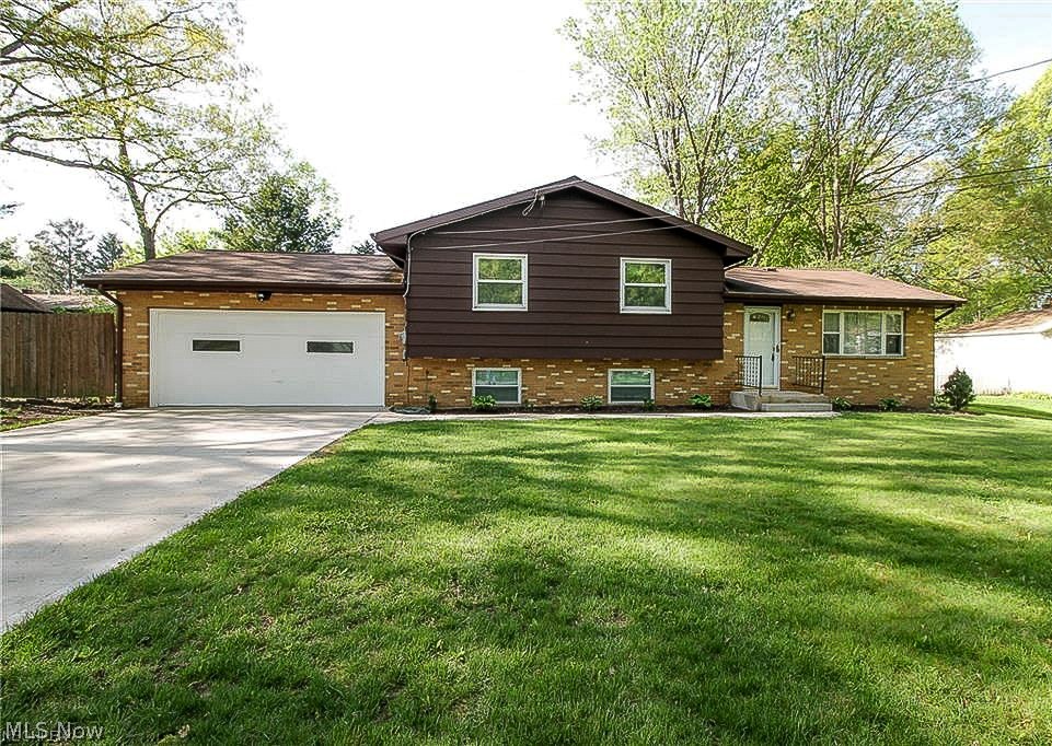 Welcome home to 2224 Conwill! This beautiful split level home is just waiting for it's new owners! All the work has been done, all you need to do is move in! There is a beautiful living room awaiting you with a gorgeous wood floor recently installed in 2013. The open concept main floor opens to dining room with sliders where you can step out onto your patio and enjoy your peaceful backyard retreat! The kitchen which has a new gas range/oven, newer stainless refrigerator, and newer lights throughout the home. The bath has been updated, newer tile 2015. Lower level windows replaced 2015, and newer wood floors in lower level, rest vinyl double hung, 2013 garage door opener and a new driveway and walkway in 2014 as well as new downspout drains to the street. The wooden privacy fence was installed in 2011 as well as the electrical panel. This home is definitely a must see! The exterior and all interior has been freshly painted (2018) with all new exterior lights outside. Water heater (2016)