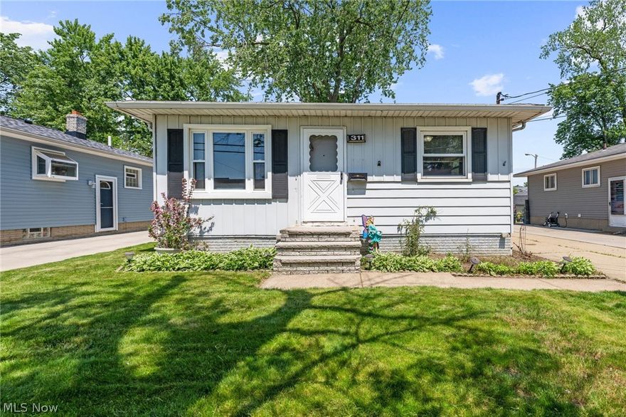 This charming 3 bedroom, 2 full bath ranch is situated on a quiet street in a convenient location close to schools and parks! Step inside to a spacious living room featuring newer carpet and plenty of room to relax or entertain. The adjoining eat-in kitchen offers ample cabinet and counter space and includes all appliances. The main floor features three comfortable bedrooms and a full bath, providing easy one-floor living. Downstairs, you'll find nearly 1,000 additional square feet of finished living space including a large rec room, office, storage room, laundry area, and a second full bath - perfect for hobbies, work from home space, or entertaining guests. Outside, enjoy the detached two car garage and a nice sized backyard with plenty of room for outdoor activities. Move right in and bring your personal touches to make this home your own!