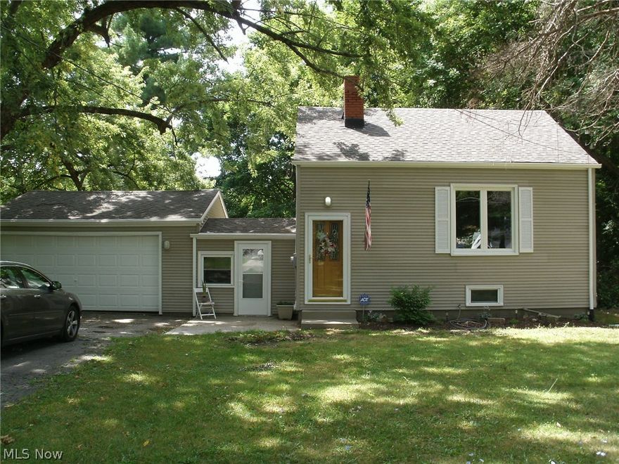 A MUST SEE!!!   This Tri level home is Beautiful and Definitely Move In.  All Neutral colors, Wood flooring, Ceramic tile, New carpeting, New roof, HWT and MANY new or remodeled throughout the home. The Dry-Basement with a Clean, very Functional SHOWER.  The Breezeway is enclosed and finished with style.  Enjoy the Privacy of the fenced in 1 acre lot in Austintown.   Extra area on the west side of the house could be used for a Driveway also.
  Do Not Miss This Unique Home!!